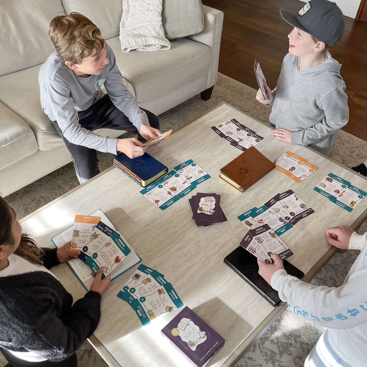 Kids playing Books of the Bible Card Game